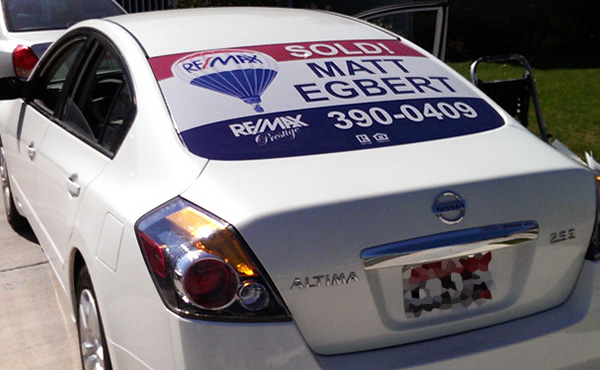 real estate car graphics and wraps